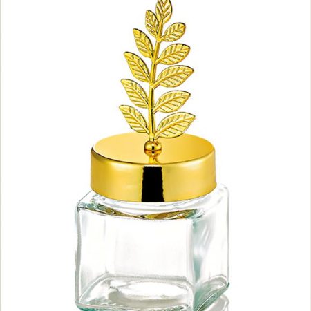 ΜΠΟΜΠΟΝΙΕΡΑ ΒΑΖΑΚΙ ΓΥΑΛΙΝΟ 60ml ΜΕ ΧΡΥΣΟ ΚΑΠΑΚΙ ΚΛΑΔΙ ΕΛΙΑΣ 4.5X4.5X11CM